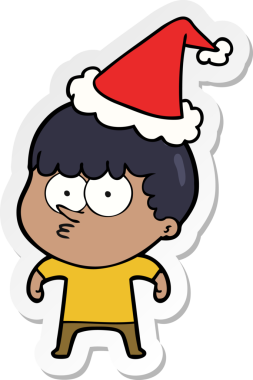 Bir insan tarafından çizilmiş Noel Baba şapkası giyen meraklı bir çocuğun el yazısı.