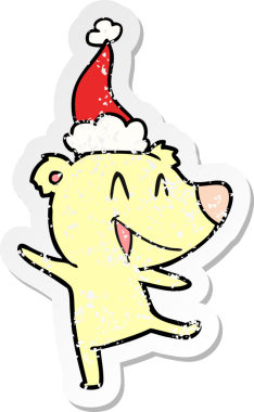 Gülen ayı eli, bir insan tarafından çizilmiş Noel Baba şapkasının sıkıntılı çıkartmasını çizmiş.