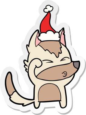 Bir insanın çizdiği Noel Baba şapkasıyla somurtan bir kurdun el yazısı.