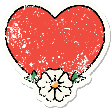 Bir insan tarafından çizilmiş geleneksel kalp ve çiçek stili dövmesi.