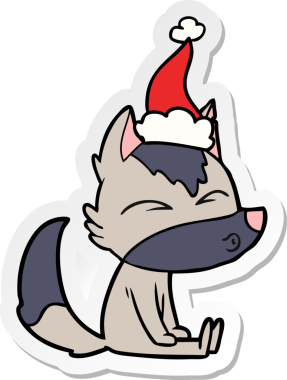 Bir insan tarafından çizilmiş Noel Baba şapkasıyla ıslık çalan bir kurt resmi.