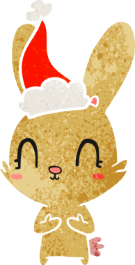 Bir insan tarafından çizilmiş Noel Baba şapkası takan eski bir tavşan çizimi.