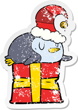 Bir insan tarafından çizilmiş noel şapkası giyen bir penguen karikatürü.