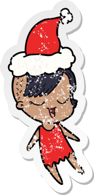 Noel Baba şapkası takan bir kızın insan tarafından çizilmiş üzgün bir el çıkartması çizimi.