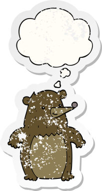 Düşünce baloncuğu olan çizgi film ayısı bir insan tarafından çizilmiş yıpranmış bir çıkartma.