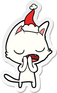 Konuşan kedi eli çizilmiş bir karikatür. Bir insan tarafından çizilmiş Noel Baba şapkası.