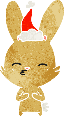 Meraklı tavşan eli bir insan tarafından çizilmiş eski bir Noel Baba şapkası çizimi.