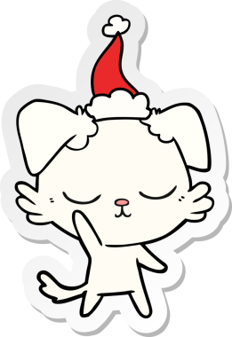 Bir insan tarafından çizilmiş Noel Baba şapkası takan bir köpeğin çizdiği el yazısı.