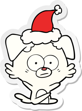 Sinirli köpek eli insan tarafından çizilmiş Noel Baba şapkasının çıkartması.