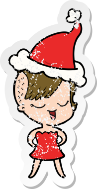 Mutlu el çizimi, bir insan tarafından çizilmiş Noel Baba şapkası giymiş bir kızın karikatürü.