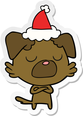 Bir insan tarafından çizilmiş Noel Baba şapkası takan bir köpeğin el yazısı.