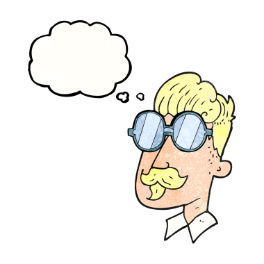 Bıyıklı ve gözlüklü bir insan tarafından çizilmiş baloncuk desenli bir çizgi film karakteri.