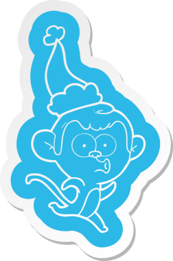 Şaşırmış bir maymunun insan tarafından çizilmiş Noel Baba şapkası.