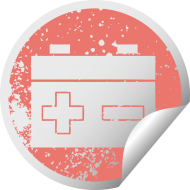 Bir insan tarafından çizilmiş araba aküsünün sıkıntılı, dairesel soyulan çıkartması.