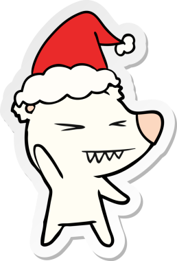 Kızgın kutup ayısı eli bir insan tarafından çizilmiş Noel Baba şapkasının çıkartmasını çizmiş.