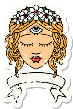 Üçüncü gözü ve bir insan tarafından çizilmiş çiçek taçlı bayrak takılmış eski bir çıkartma.