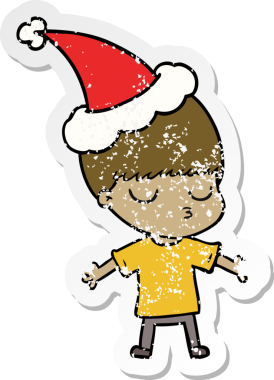 Bir insan tarafından çizilmiş Noel Baba şapkası giymiş sakin bir çocuğun el çizimi karikatürü.