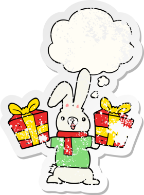 Karikatür tavşanı üzerinde noel baloncuğu olan bir insan tarafından çizilmiş yıpranmış bir çıkartma.