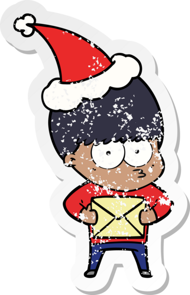 Sinirli el, bir insan tarafından çizilmiş Noel Baba şapkası takan bir çocuğun çizilmiş çıkartması.