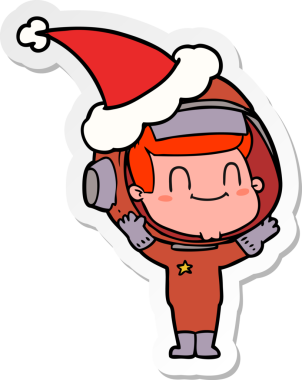 Noel Baba şapkası giyen astronot bir insan tarafından çizilmiş mutlu el yazısı.