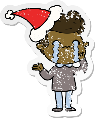 Bir insanın çizdiği Noel Baba şapkasıyla ağlayan bir adamın el yazısı.