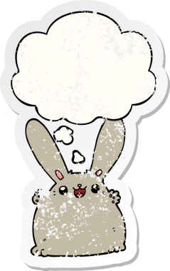 Düşünce baloncuğu olan çizgi film tavşanı insan tarafından çizilmiş yıpranmış bir çıkartma.
