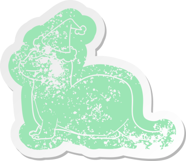 Gülen su samuru çizgi filmi bir insan tarafından çizilmiş Noel Baba şapkasının çıkartması.