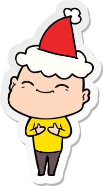 Bir insan tarafından çizilmiş Noel Baba şapkası giymiş kel bir adamın mutlu el çizimi karikatürü.