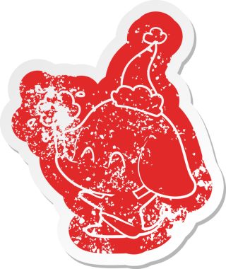 Sevimli çizgi film, insan tarafından çizilmiş Noel Baba şapkasıyla su püskürten bir filin hüzünlü çıkartması.