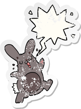 Konuşma baloncuğu olan çizgi film tavşanı bir insan tarafından çizilmiş sıkıntılı eski bir çıkartma