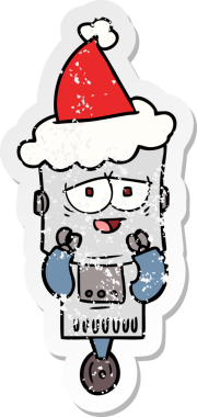 Bir insan tarafından çizilmiş Noel Baba şapkası takan bir robotun çizilmiş el yazısı.