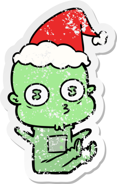 Bir insan tarafından çizilmiş Noel Baba şapkası giymiş garip kel bir uzaylının çizilmiş el yazısı.