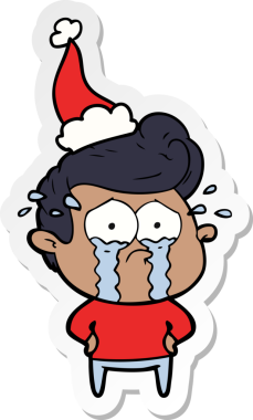 Bir insan tarafından çizilmiş Noel Baba şapkası takan ağlayan bir adamın el yazısı.
