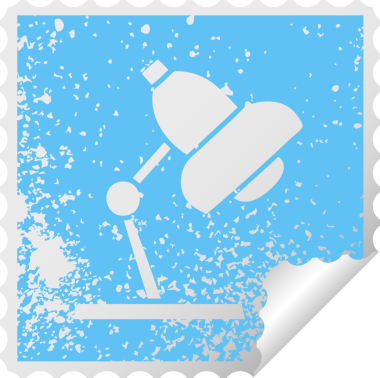 Bir insan tarafından çizilmiş bir masa lambasının kare soyma etiketi.