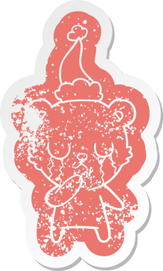 Ağlayan kutup ayısı çizgi filmi bir insan tarafından çizilmiş Noel Baba şapkasının çıkartması.