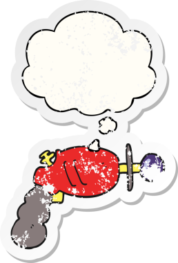 Düşünce baloncuklu karikatür ışın tabancası insan tarafından çizilmiş yıpranmış bir çıkartma gibi.