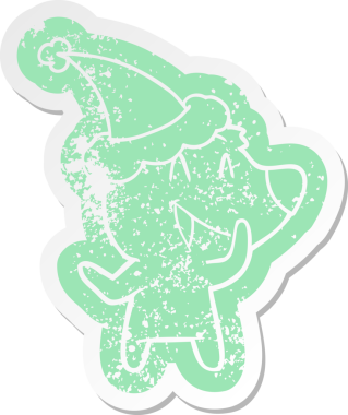 Gülen ayı çizgi filmi, bir insan tarafından çizilmiş Noel Baba şapkasının çıkartması.