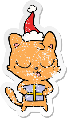 Bir insan tarafından çizilmiş Noel Baba şapkası takan bir kedi çizilmiş.