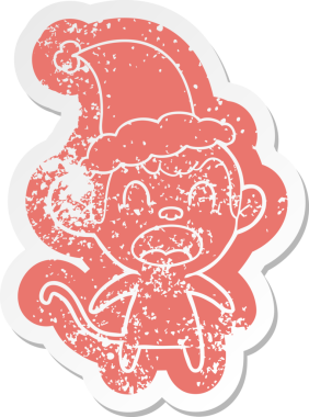 Bir insan tarafından çizilmiş Noel Baba şapkası giymiş bir maymunun garip bir karikatürü.