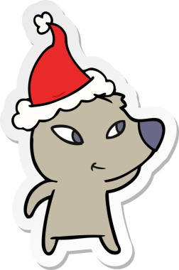 Bir insan tarafından çizilmiş Noel Baba şapkası takan bir ayının çizilmiş şirin el yazısı.