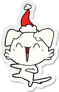 Mutlu dans eden köpek eli çizilmiş bir insan tarafından çizilmiş Noel Baba şapkası.