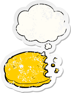 Düşünce baloncuklu çizgi film kurabiyesi insan tarafından çizilmiş yıpranmış bir çıkartma.