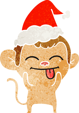 Bir insan tarafından çizilmiş Noel Baba şapkası takan bir maymunun komik el çizimi