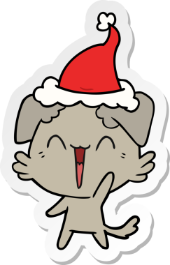 Mutlu, küçük köpek eli çizilmiş bir insan tarafından çizilmiş Noel Baba şapkası.