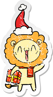 Mutlu el, bir insan tarafından çizilmiş Noel Baba şapkası takan bir aslanın kederli çıkartması.