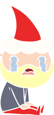 Bir insanın çizdiği Noel Baba şapkasıyla ağlayan sakallı bir adamın el resmi.