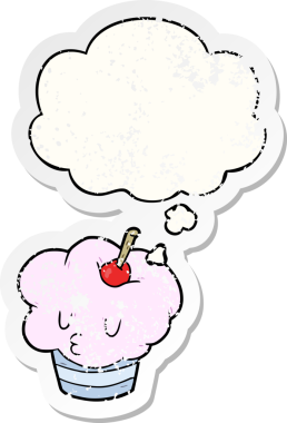 Düşünce baloncuklu çizgi film keki bir insan tarafından çizilmiş yıpranmış bir çıkartma.