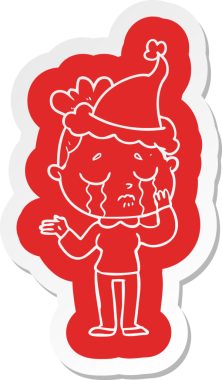 Bir insan tarafından çizilmiş Noel Baba şapkası giyen ağlayan bir kadının garip çizgi film çıkartması.