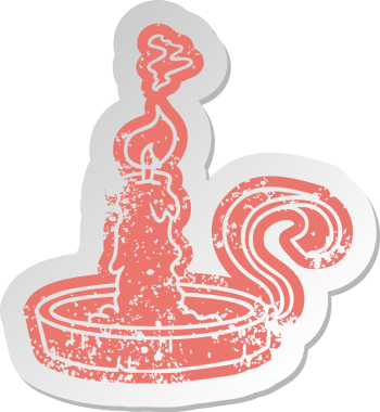 Bir mum tutacağının eski çizgi film çıkartması ve bir insan tarafından çizilmiş mum.