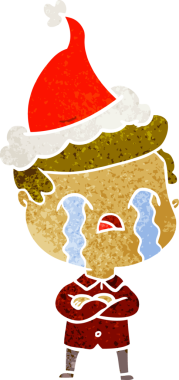 Bir insanın çizdiği Noel Baba şapkasıyla ağlayan bir adamın el çizimi karikatürü.